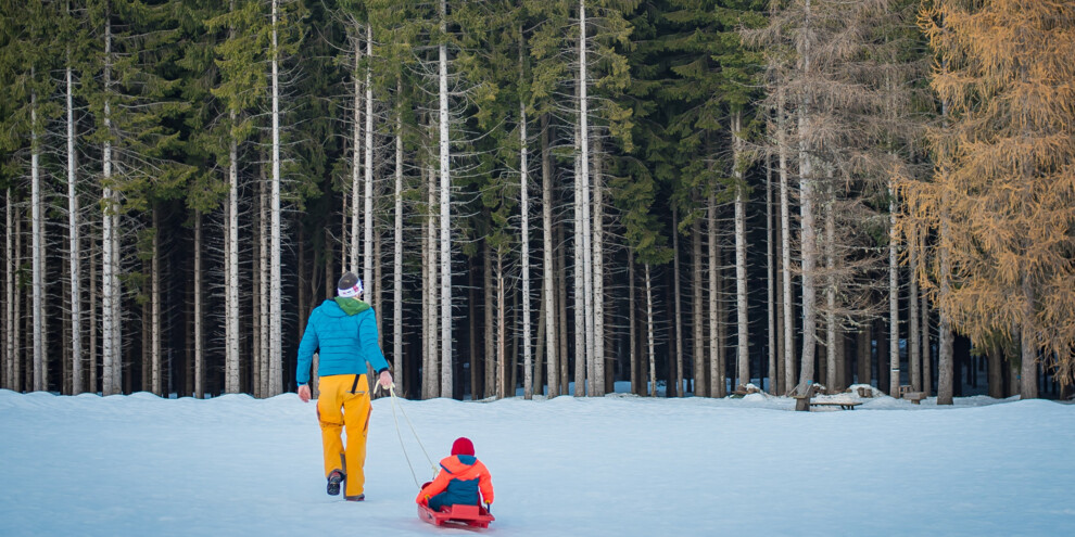 Papà con bambino nella neve - Bob | © Galvagni