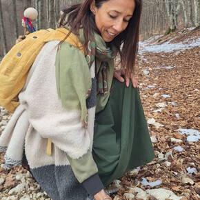Annachiara Zecchetto gathering natural elements in the woods during a Nature Therapy session for the LiberaMente event taking place in Andalo, Paganella, Trentino.