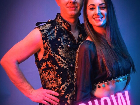 The image shows the artists Moris and Jenny.