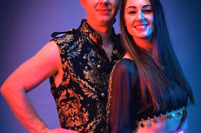 The image shows the artists Moris and Jenny.