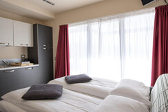 Cucina con divano-letto aperto app.