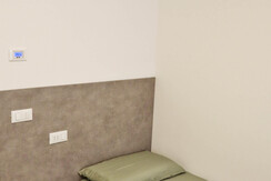 CAMERA DA LETTO CON DUE LETTI SINGOLI