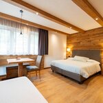  Foto von Dreibettzimmer