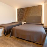 Foto di Camera Quadrupla Comfort vista giardino