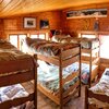  Foto von Hütte - Betten im Schlafsaal