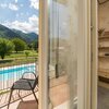Foto di Bilocale primo piano vista piscina