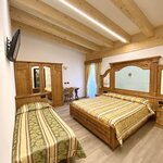  Foto von Dreibettzimmer - Deluxe