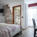  Foto von Familienzimmer