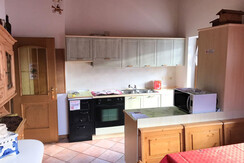 Well-equipped kitchen with stovetop