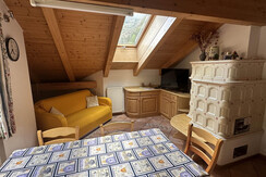 Living room with stove and table