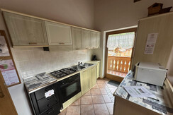 Bright kitchen with balcony access