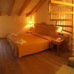  Foto von Familienzimmer