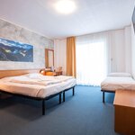  Foto von Dreibettzimmer