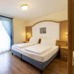 Foto di Junior suite standard angolo cottura e vista lago