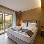 Foto di Junior suite con sauna e vista lago