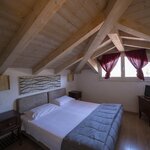  Foto von Doppel-/Zweibettzimmer - Dachgeschoss