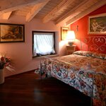  Foto von Komfort-Dreibettzimmer