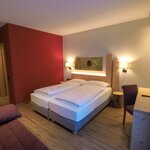  Foto von Dreibettzimmer