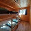  Foto von Hütte - Betten im Schlafsaal