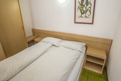 camera in divisoria soggiorno