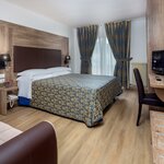  Foto von Familienzimmer