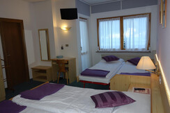 Alpine-Touring-Hotel-Pozza-di-Fassa_Family room