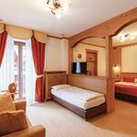  Foto von Familienzimmer