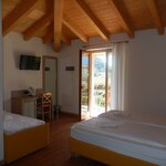 Foto di Camera Family con terrazzo (Violetta - Rosa)