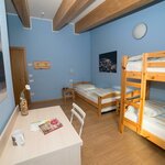 Foto di Camera tripla "Pettirosso"