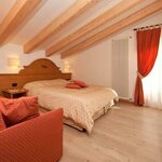 Foto di Camera Doppia Superior con divano