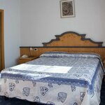  Foto von Dreibett Suite mit Balkon (non refundable)