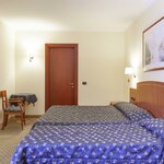  Foto von 3Bettzimmer