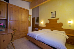 Camera doppia in suite trilocale