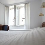 Foto Třílůžkový pokoj, sprcha nebo vana | © Hotel Venezia - Trento
